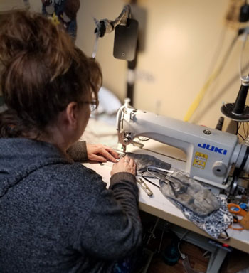 Woman sewing a face mask